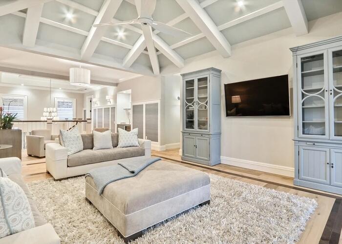 Living room with wall-mounted tv.